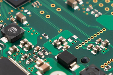 Circuit board with resistors microchips and electronic components background. Computer hardware...