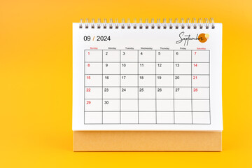 September 2024, Monthly desk calendar for 2024 year on yellow background.