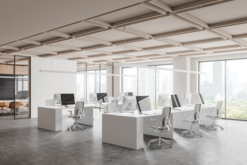 Stylish office interior with coworking and meeting zone, panoramic window