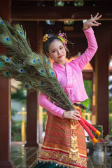Ancient Thai traditional dress performance in the form of preserving dress culture of the Tai,...