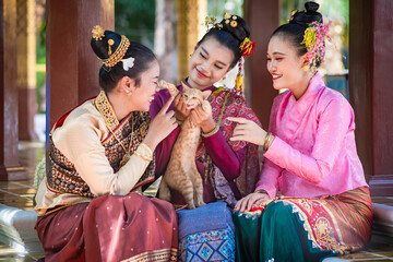 Ancient Thai traditional dress performance in the form of preserving dress culture of the Tai,...