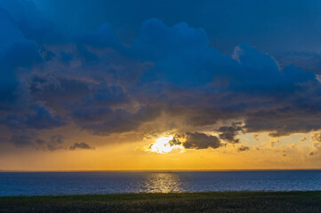 Evening Sky with Dramatic Clouds Over the Lake. Dramatic Sunset Over the Lake. The Sabbath. National Sunset Day. Vortsjarve Lake Estonia