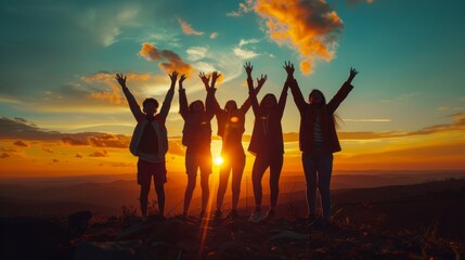A group of people are standing on a hillside, with the sun setting behind them