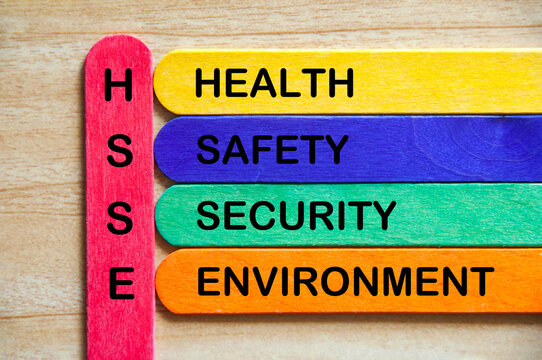 Top view of HSSE text representing health, safety, security and environment on multicolored wooden sticks. Safety concept