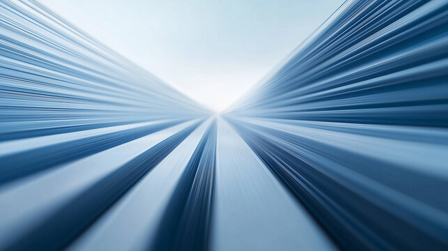 A perspective view of abstract blue and white lines creating a sense of motion and speed with a soft gradient effect