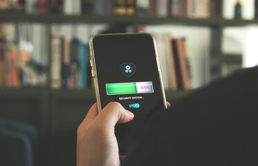 Security system installation, data security protection. Smartphone screen showing installation application with online network