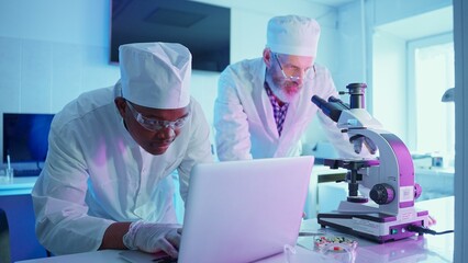 Researchers Analyzing Chemical Samples in a Modern Laboratory Environment