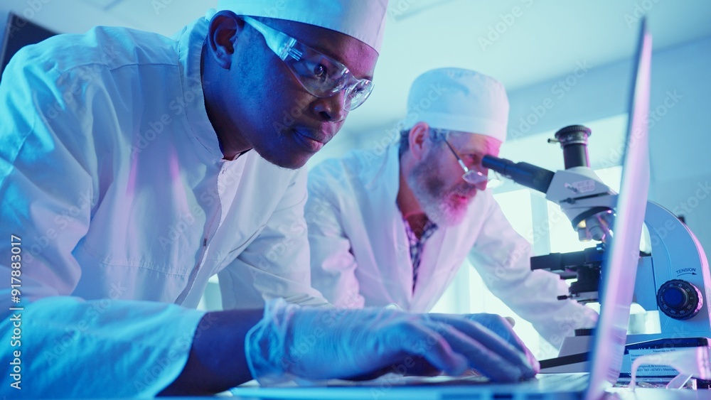 Wall mural research chemists analyzing data in innovative laboratory with advanced equipment