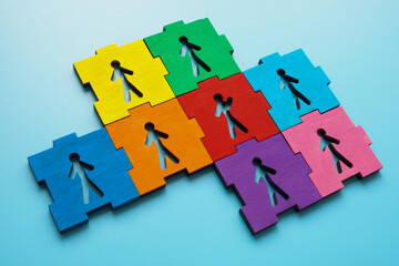 Abstract concept of diversity, activism, and leadership. Colorful puzzle pieces with figures.