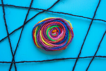 Abstract bundle of colorful threads. Concept of unity, allyship, and resilience.