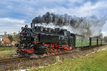 a German narrow gauge steam locomotive heading for the mountains