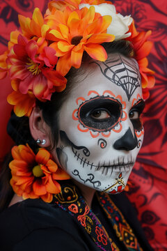Woman with colorful Dia de Muertos makeup looking at the camera. Generative AI image