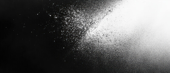 A black and white photo of a white cloud of powdery substance
