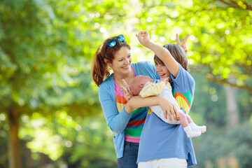 Portrait of happy woman with kids