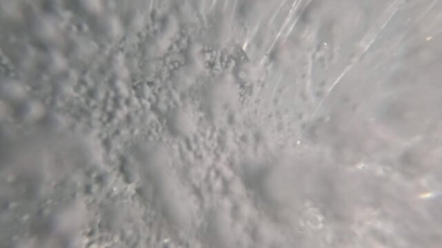 Underwater video of jacuzzi jets releasing air bubbles perfect for massage spa and well being