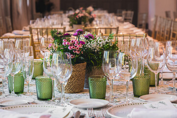 Elegant banquet table setting with floral centerpiece