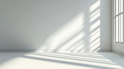 a white room with a window and a white wall