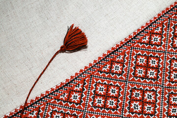 Beauty fashion cloth hand made crafting elements Ukrainian shirt fabric material background surface...