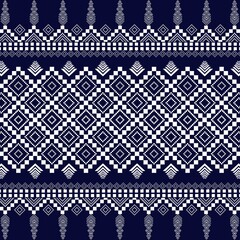 Fototapeta premium This American ethnic fabric pattern features a classic geometric design in striking and ethnic white blue tones. Perfect for the textile ethnic industry, this pattern blends traditional tribal 
