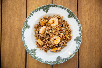 Rice with mussels and shrimp on a plate