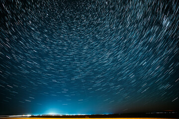 Flight Of Fancy. Unusual Amazing Star Trails On Night Sky Backgr