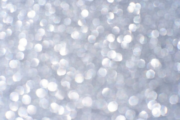 Bokeh circle with silver sparkles background. Grey glitter backdrop. Monochrome texture. New year luxury snow. Copyspace. Shimmer confetti wallpaper. Dreamy shiny design detail. Christmas