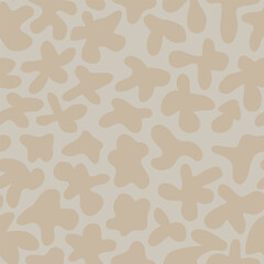 Seamless pattern with soft, organic shapes scattered randomly across a light background.