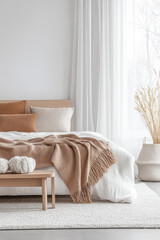 Modern Scandinavian luxury bedroom interiors with an elegant bed and minimal decoration next to a large window.
