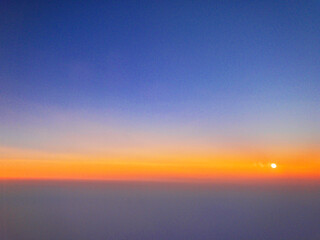 Sunrise above the clouds