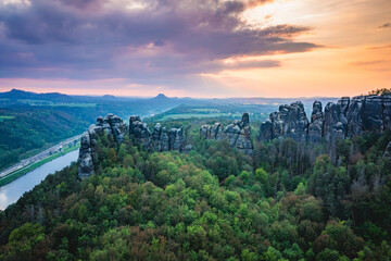 aerial view on schrammsteine in saxon switzerland during sunset