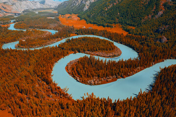 Beautiful aerial photo autumn landscape, , Altai Russia. Winding blue river meander in mountains...