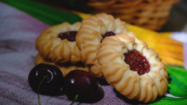 Cookies with berry cherry jam. Homemade freshly fruit baked shortbread cookies