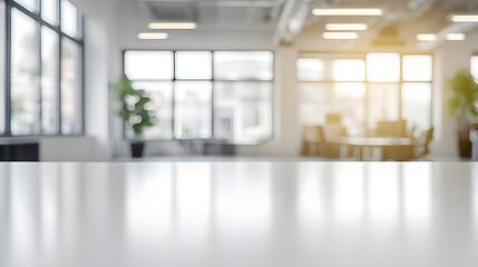 Empty white table with blurred office background.