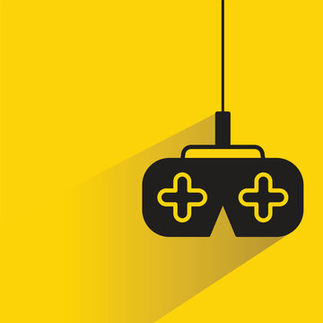 joystick icon with shadow on yellow background