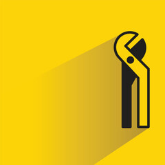 wrench icon with shadow on yellow background