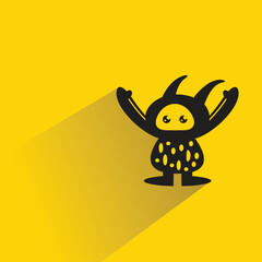 alien monster character with shadow on yellow background