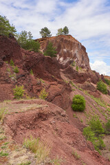 Extinct volcano with rock formations and vegetation