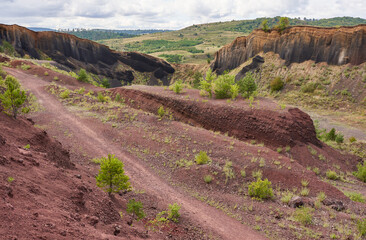Extinct volcano with rock formations and vegetation
