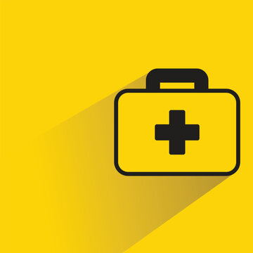 first aid bag with shadow on yellow background