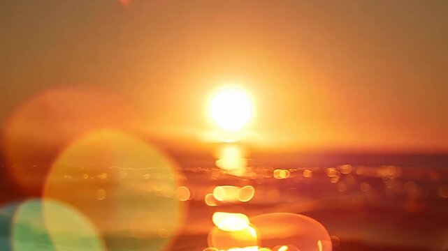 Sunset time with a big sun and a cloudless sky.