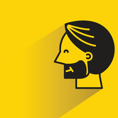 male face side view avatar with shadow on yellow background