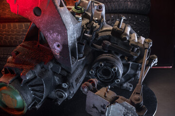 old car gearbox dirty from a front-wheel drive car dismantled for repair