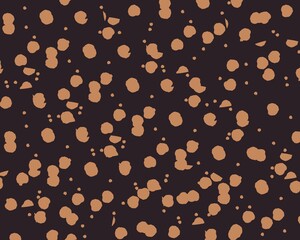 An abstract background with a dark brown color scheme. It features a scattered pattern of light brown circles and dots of varying sizes