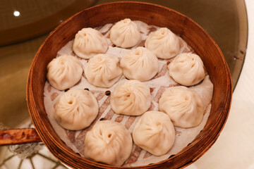 close up of Chinese or Taiwanese Shanghai style steamed soup dumpling buns or can be called 