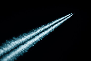 Speeding Jet Fuel Trail or Comet Streak: A Meteor, Rocket Launch, or Supernatural Light Racing Through the Darkness, Leaving a Fiery Contrail of Light and Vapor
