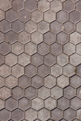 Texture of concrete paving stones in the form of honeycombs. Close-up Fragment. Top view. Background