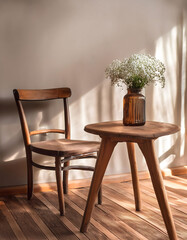 A wooden table with a vase of flowers and a chair sitting next to it. 