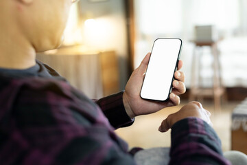cell phone blank white screen mockup.hand holding texting using mobile on desk at office.background empty space for advertise.work people contact marketing business,technology
