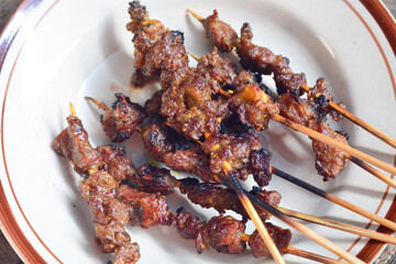 Sate or satay or sometimes written satai is food made ​​from pieces of meat (chicken, goats,...