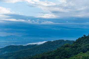 Beautiful Mountain landscape foggy windy mountain range green landscape asian farm. Amazing Landscape mountain green field meadow white cloud blue sky on sunrise. Countryside sunlight heaven scenery